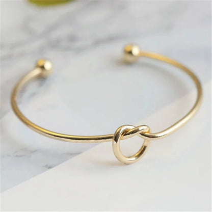 Brazalete de nudo Brisa - Dorado